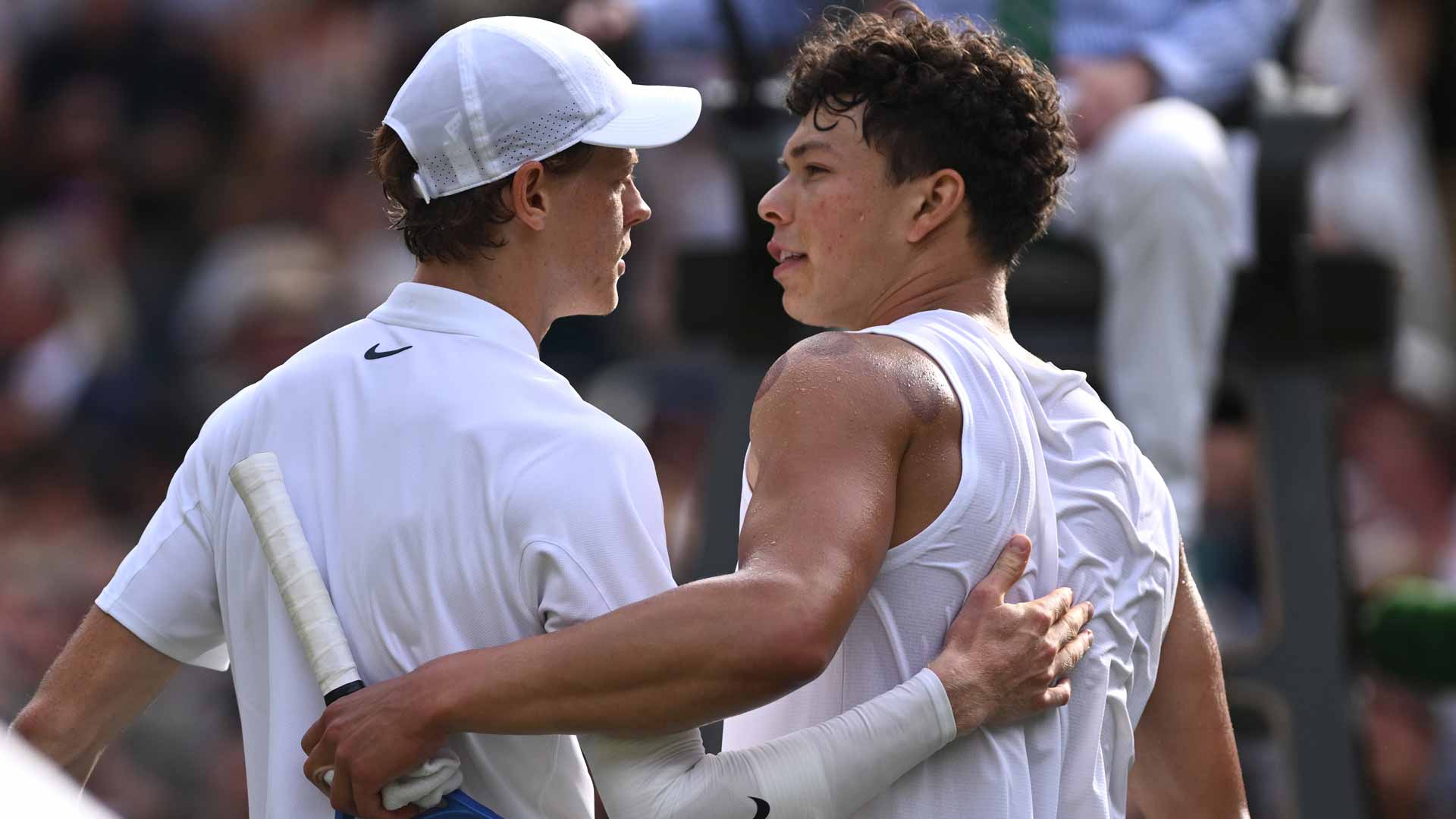 Jannik Sinner defeats Ben Shelton in straight sets on Wednesday in the Wimbledon quarter-finals.