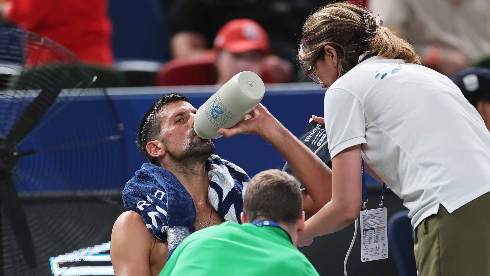Novak Djokovic receives a medical timeout Tuesday in Shanghai en route to a gruelling three-set win.