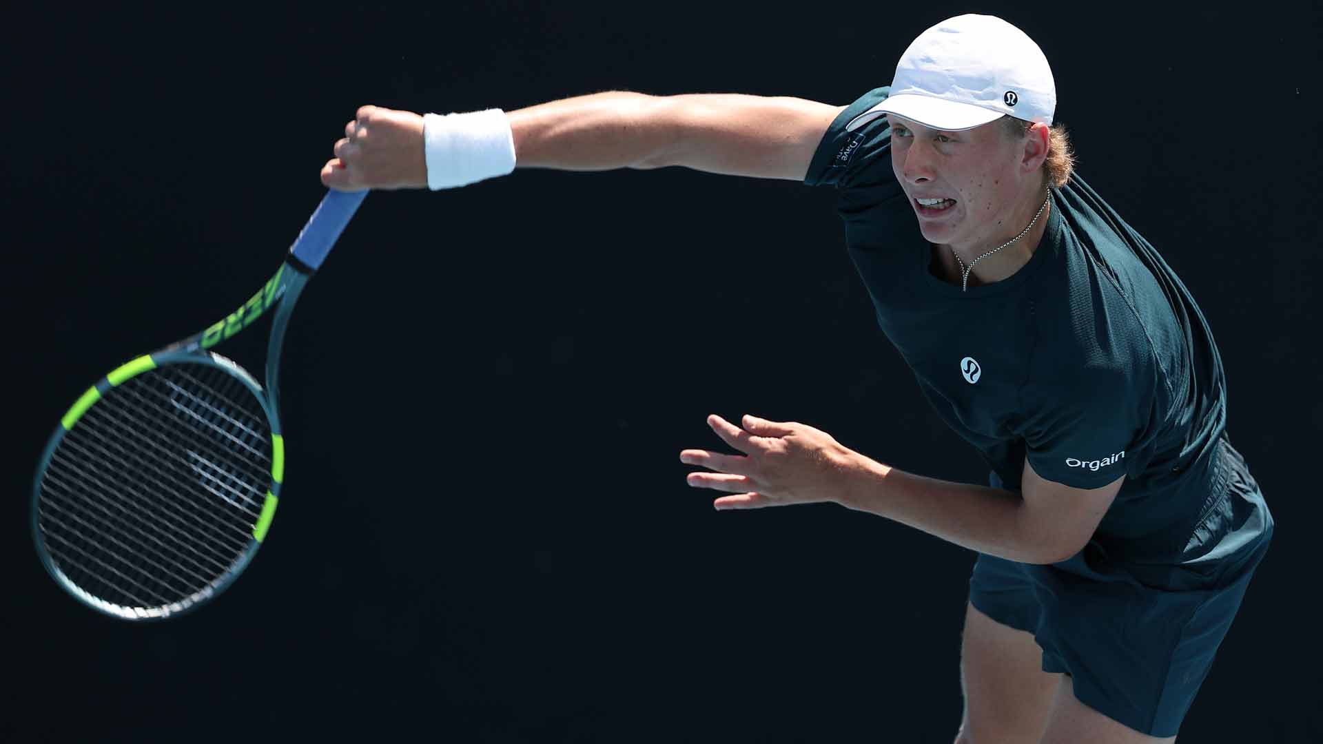 Ethan Quinn defeats Tallon Griekspoor in straight sets in the first round of the Australian Open.