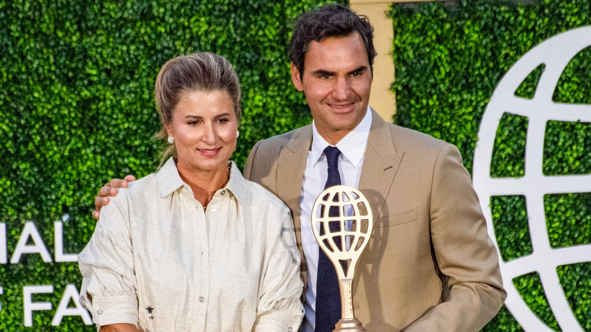Mirka Federer and Roger Federer celebrate Roger's induction into the International Tennis Hall of Fame Saturday evening.